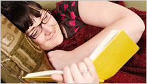 Person reading in bed